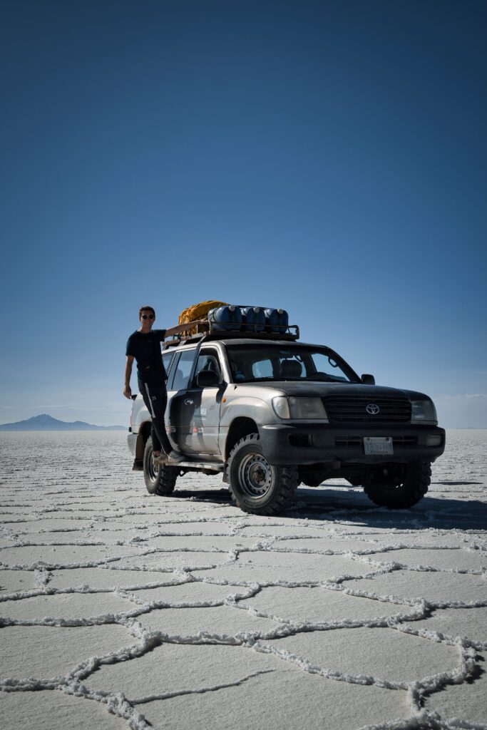 Malte in Uyuni Salt desert. Traveling as a couple with his girlfriend Vicky